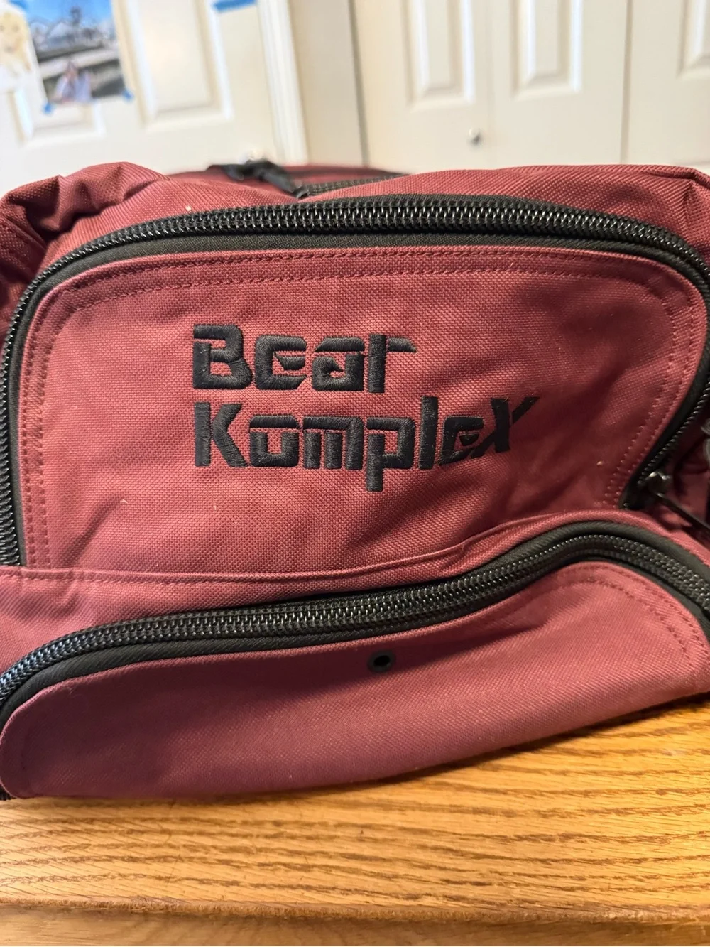 Bear Komplex Duffel Bag with Multiple Exterior Pockets Burgundy Maroon Red